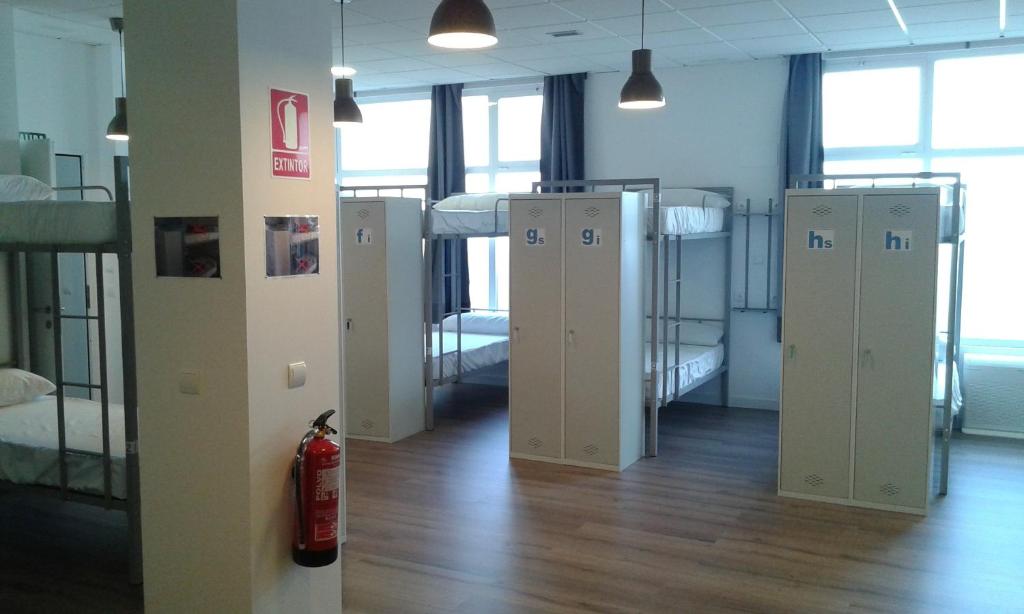 Postel nebo postele na pokoji v ubytování Check In León