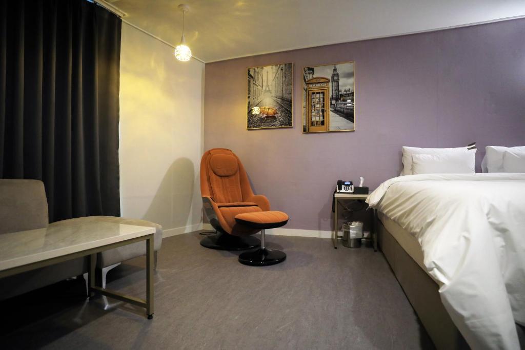 Postel nebo postele na pokoji v ubytování Brighton Hotel