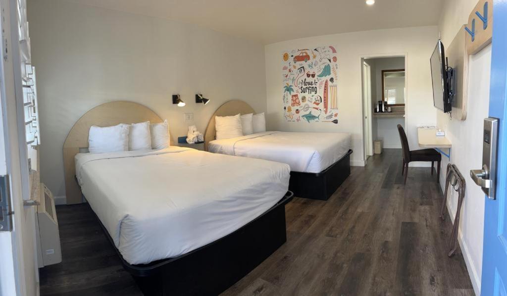 Postel nebo postele na pokoji v ubytování Ocean Palms Motel