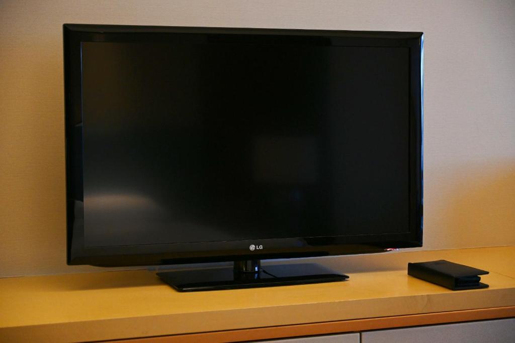TV a/nebo společenská místnost v ubytování Renaissance Huizhou Hotel