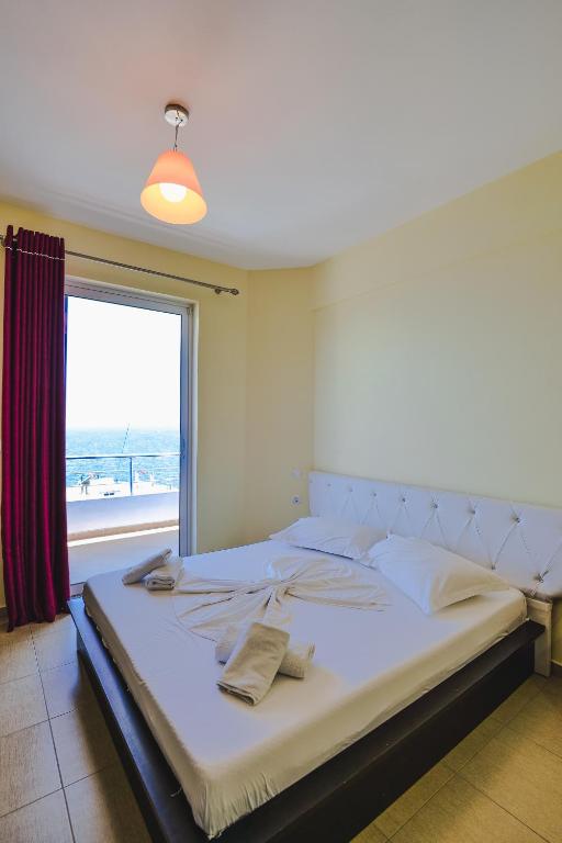 Postel nebo postele na pokoji v ubytování Summer Dream Hotel
