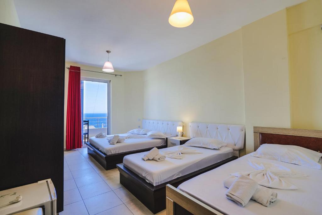 Postel nebo postele na pokoji v ubytování Summer Dream Hotel
