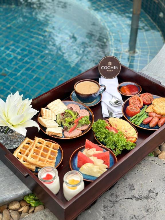 Suite Cochin Signature bao gồm bữa sáng nổi và minibar miễn phí