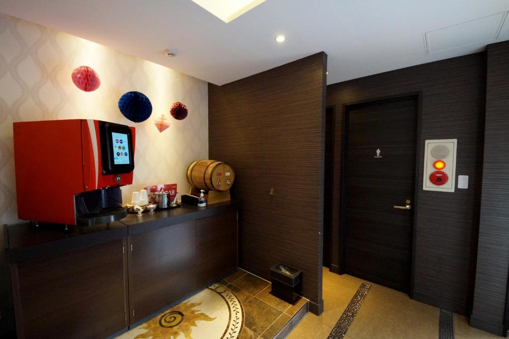 Kuchyň nebo kuchyňský kout v ubytování Hotel Lei