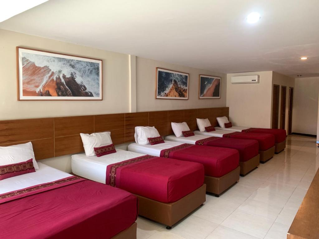 Kuta Suci Guesthouse - Family Room