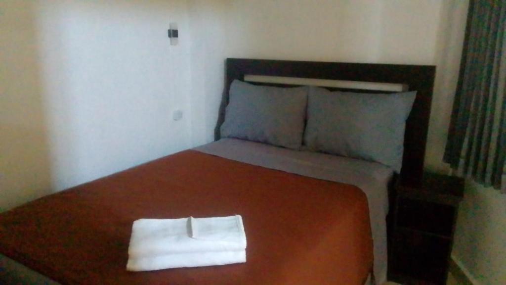 Postel nebo postele na pokoji v ubytování Hotel Arda Bali
