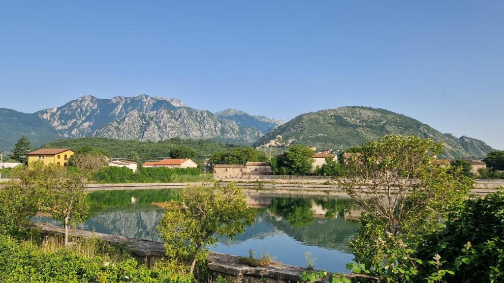 a view of a lake with mountains in the background at Casita1906 in Rocchetta a Volturno