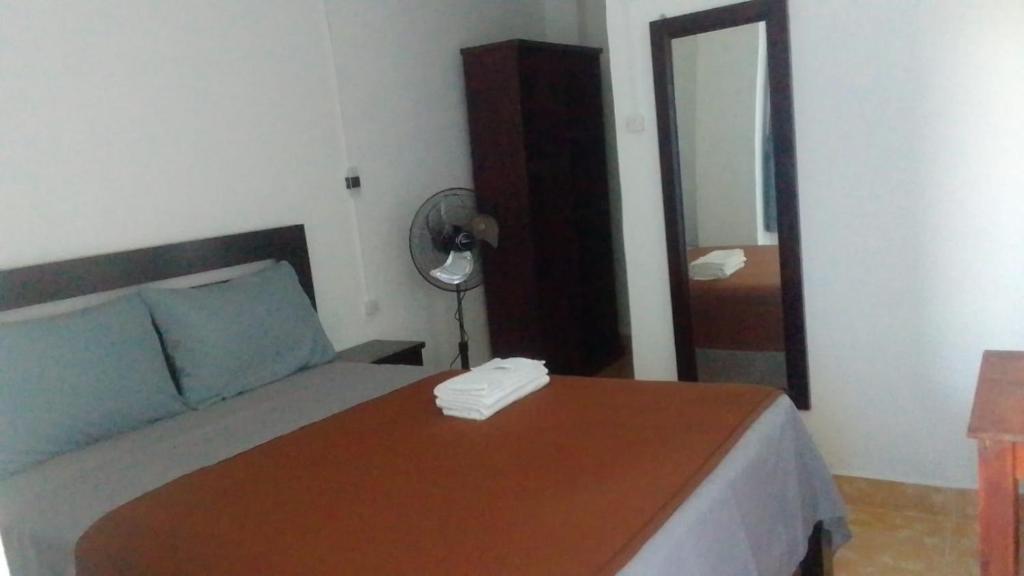 Postel nebo postele na pokoji v ubytování Hotel Arda Bali