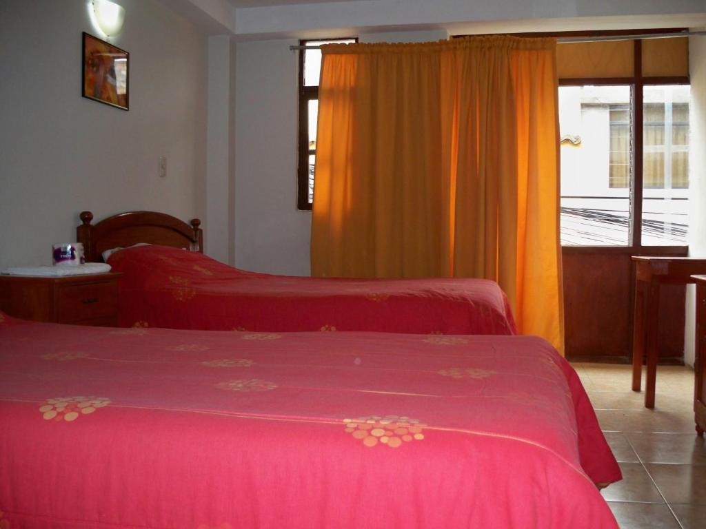 Postel nebo postele na pokoji v ubytování El Balcon Hostal