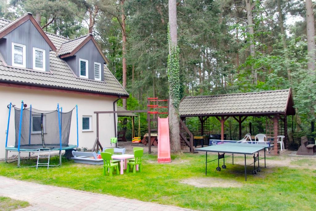 Zahrada ubytování Sztil - Apartamenty i drewniane domki
