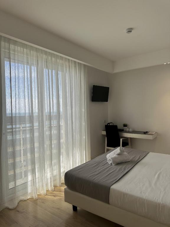 TV a/nebo společenská místnost v ubytování Boutique Hotel Bali