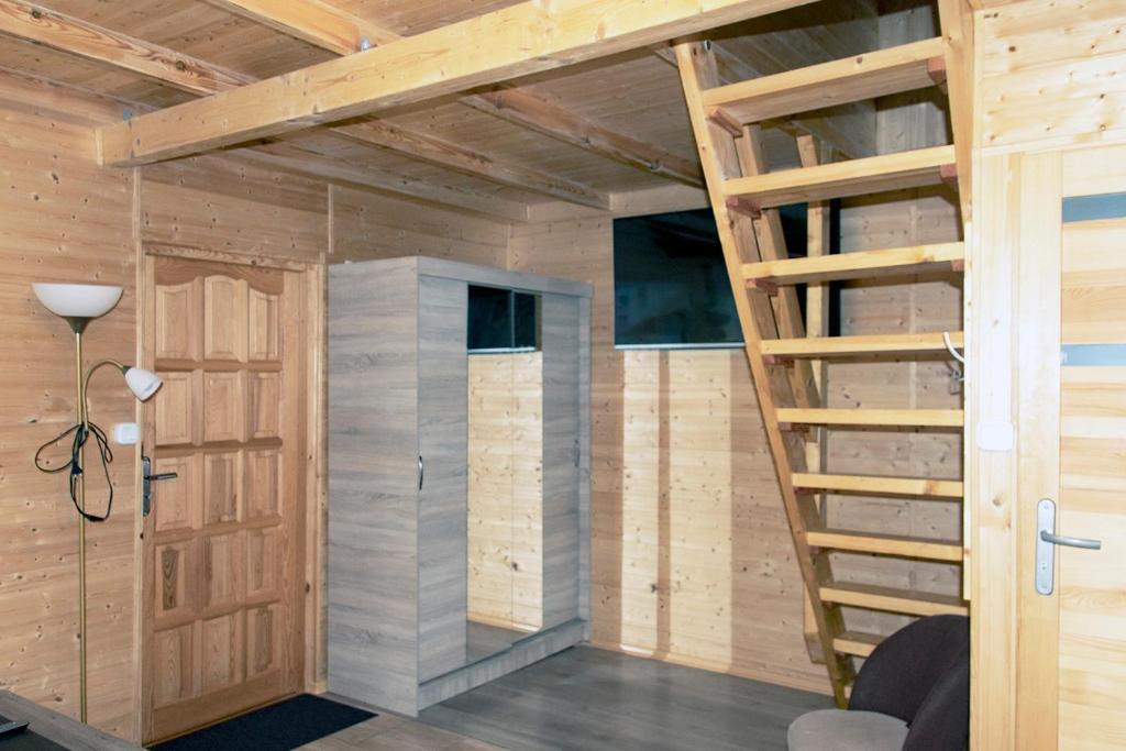 Fotografie z fotogalerie ubytování Sztil - Apartamenty i drewniane domki v destinaci Pobierowo