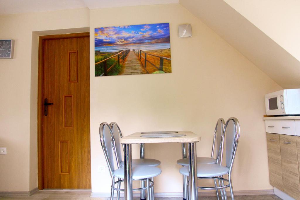 Kuchyň nebo kuchyňský kout v ubytování Sztil - Apartamenty i drewniane domki