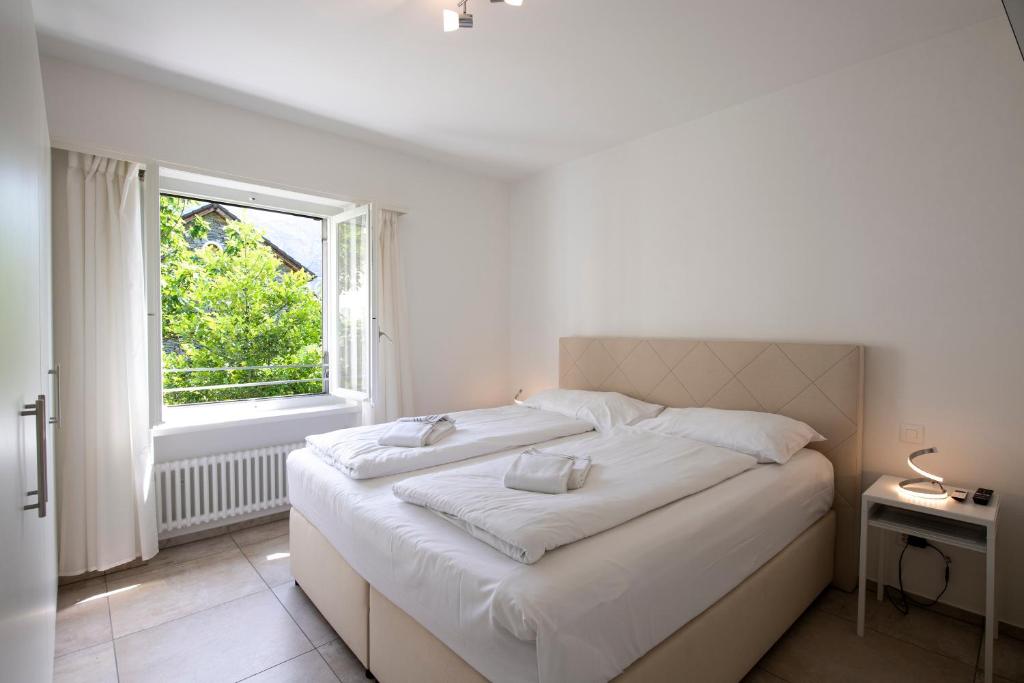Postel nebo postele na pokoji v ubytování Residenza La Serenata