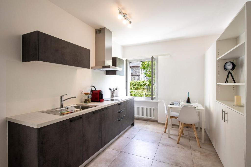 Kuchyň nebo kuchyňský kout v ubytování Residenza La Serenata