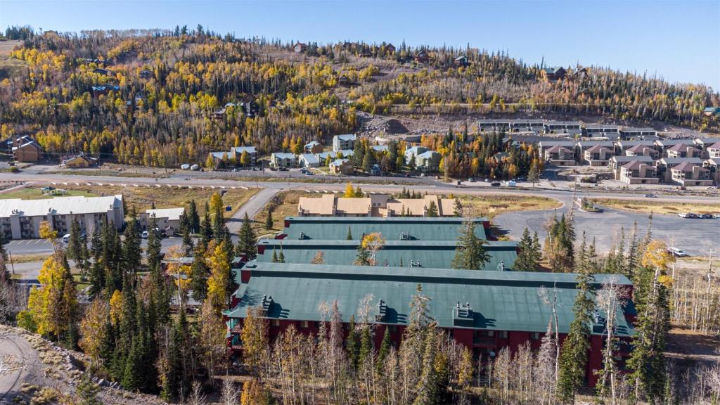 an aerial view of a building in a forest at Giant Steps 58 Ski In-out in Brian Head