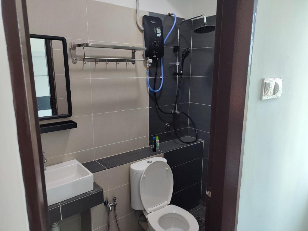 Koupelna v ubytování Homestay Studio Apartment Bentara Suite, Kompleks Mutiara Gua Musang