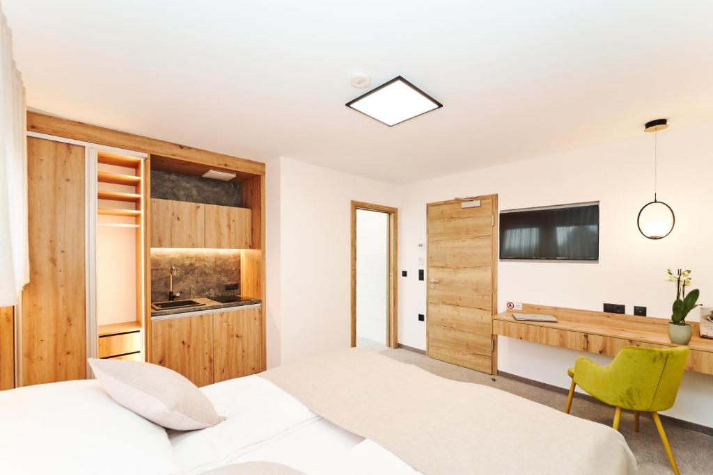Kuchyň nebo kuchyňský kout v ubytování Medirooms Apartments