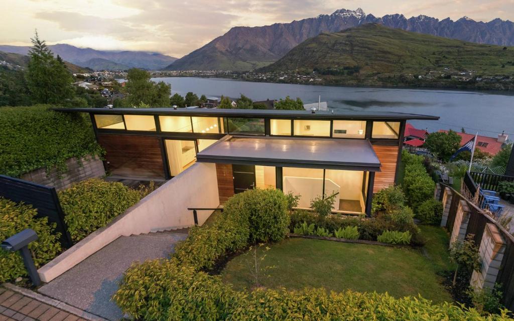 an aerial view of a house with a lake at Highview terrance 3 bedrooms house queenstown in Queenstown