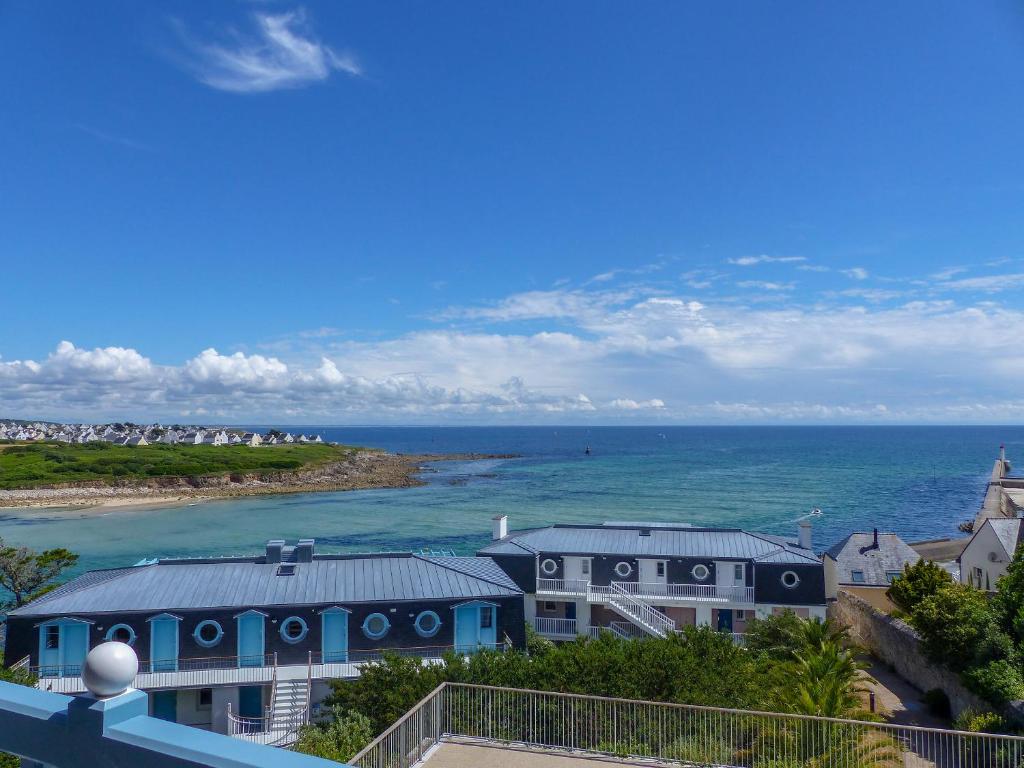 a view of the ocean from the balcony of a house at Lagrange Vacances - Les Terrasses de l'Océan in Audierne