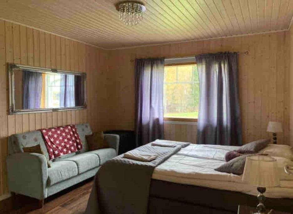 Postel nebo postele na pokoji v ubytování Villa Kupsala , LaatuLomat