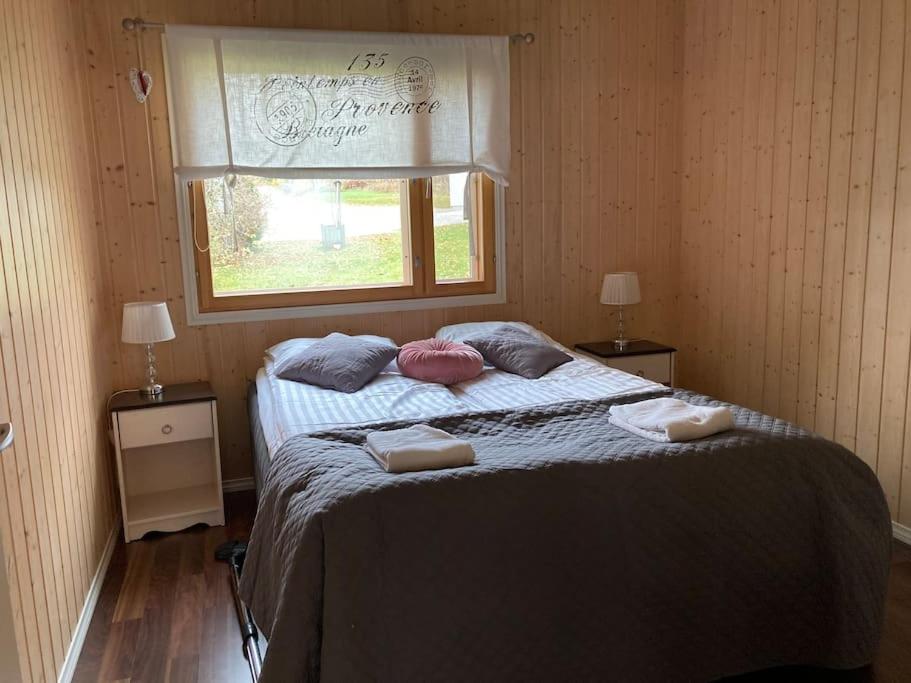 Postel nebo postele na pokoji v ubytování Villa Kupsala , LaatuLomat