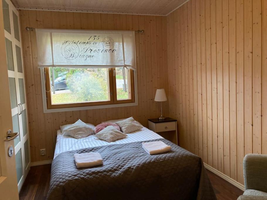 Postel nebo postele na pokoji v ubytování Villa Kupsala , LaatuLomat