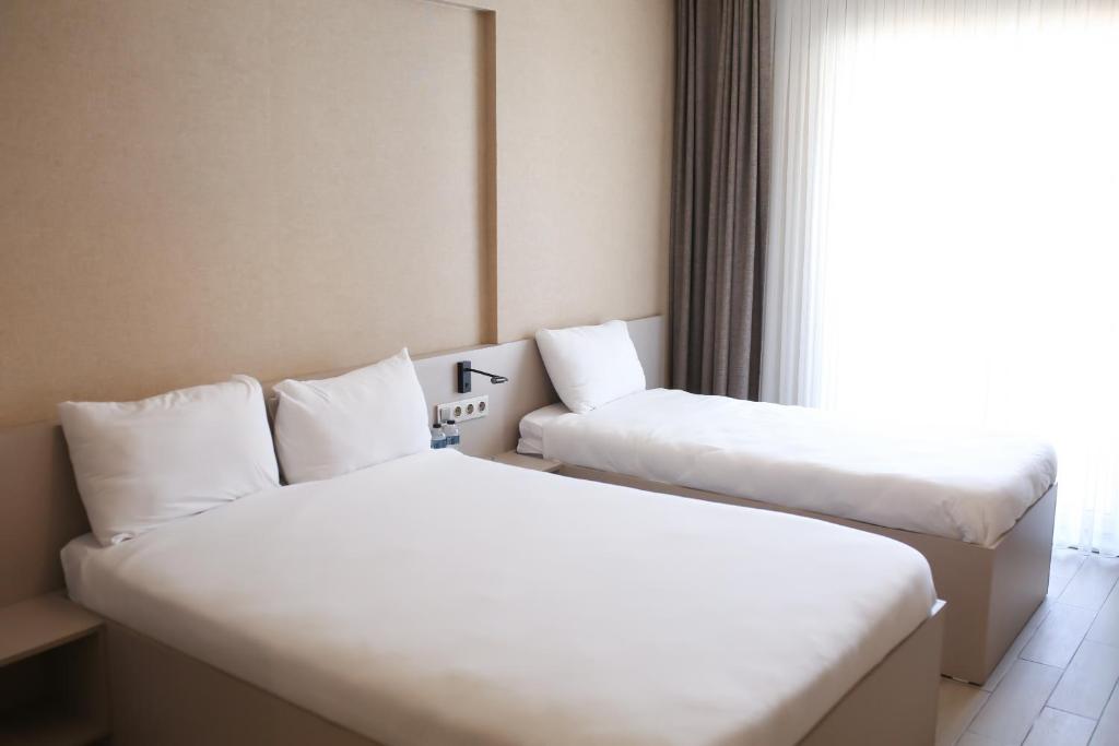 Cinas Hotel - Quarto Triplo