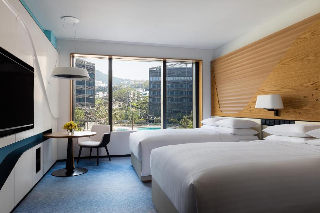 Letto o letti in una camera di Hong Kong Ocean Park Marriott Hotel
