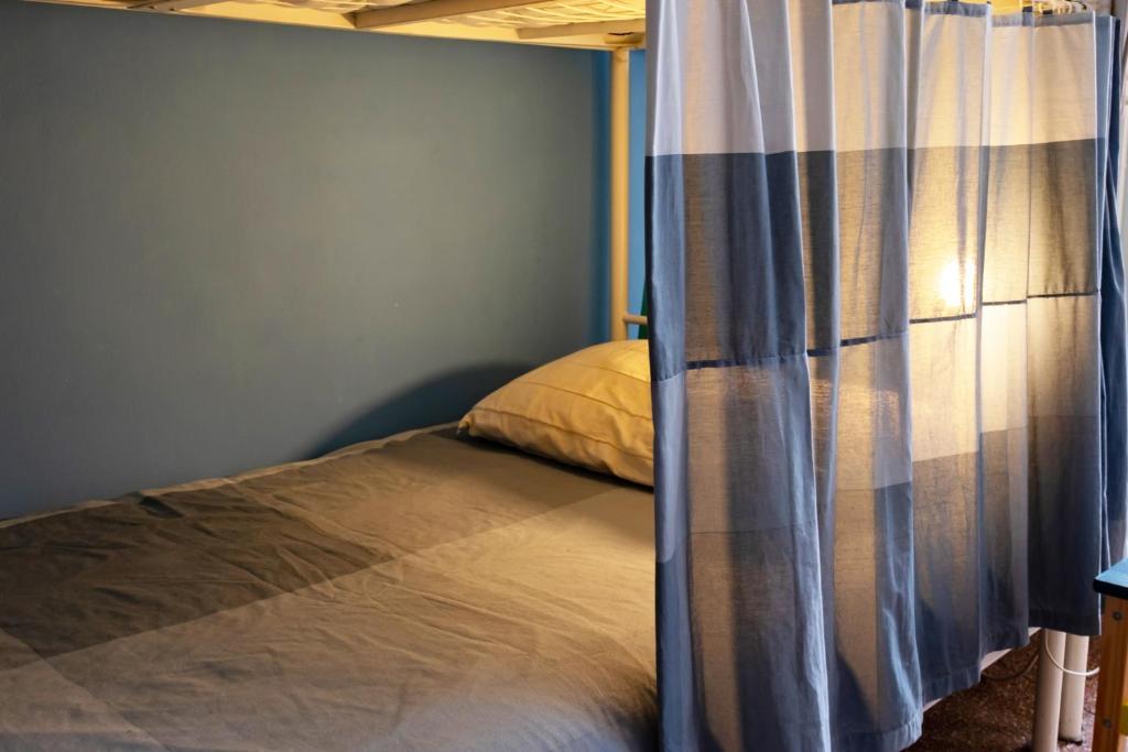 Postel nebo postele na pokoji v ubytování Manena Hostel Genova