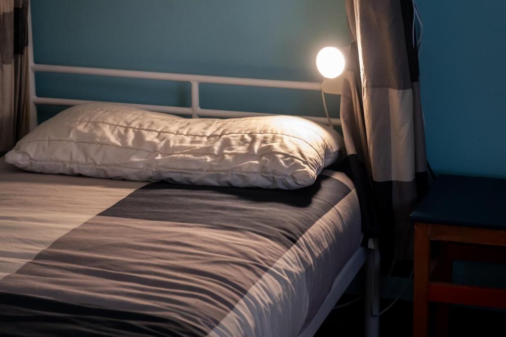 Postel nebo postele na pokoji v ubytování Manena Hostel Genova