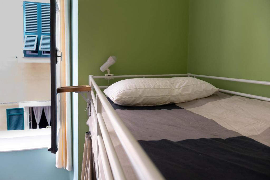 Postel nebo postele na pokoji v ubytování Manena Hostel Genova