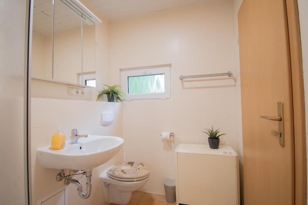 Koupelna v ubytování Tiny-Bungalow - zum Strand 50m