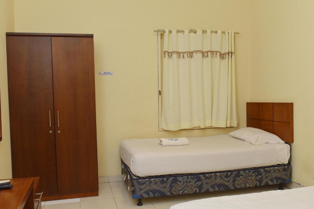 Al-Ghani Syariah Mitra RedDoorz - Camera Doppia Standard