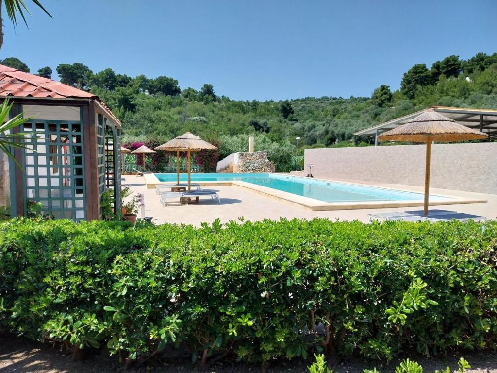 Bazén v ubytování Hotel Parco Carabella nebo v jeho okolí