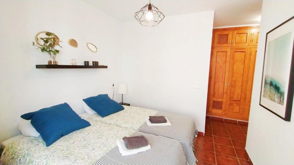 Postel nebo postele na pokoji v ubytování AP317 - Casa Aileen