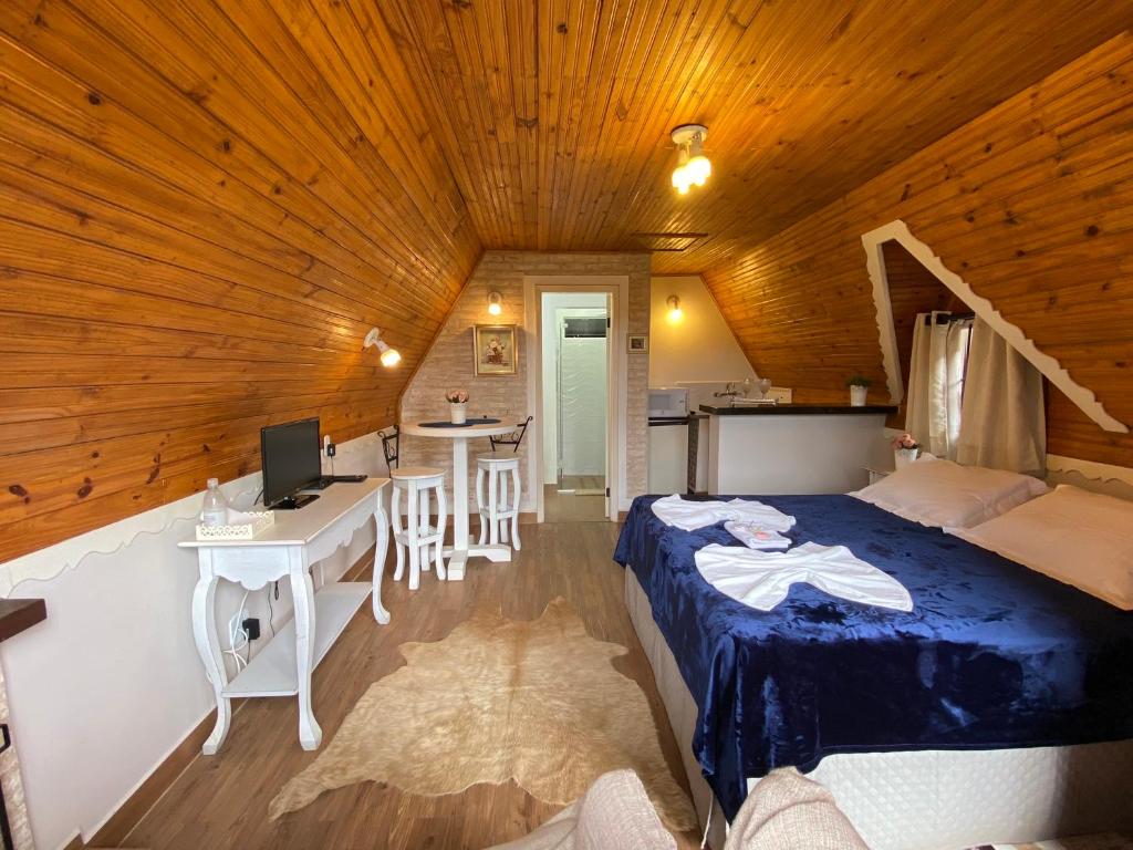 Postel nebo postele na pokoji v ubytování Chalés Paraíso Monte Verde