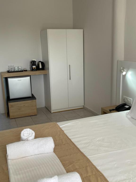 Postel nebo postele na pokoji v ubytování Armonia Hotel by Zante Plaza