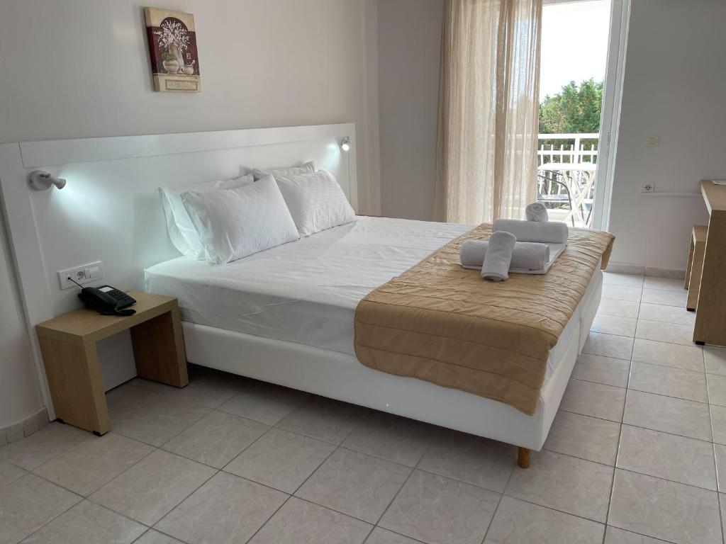 Postel nebo postele na pokoji v ubytování Armonia Hotel by Zante Plaza