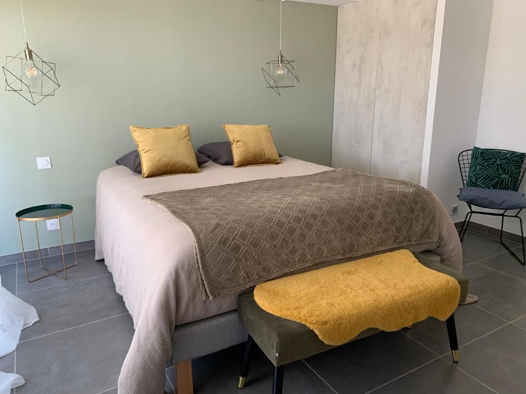 Postel nebo postele na pokoji v ubytování Escapade Martegale