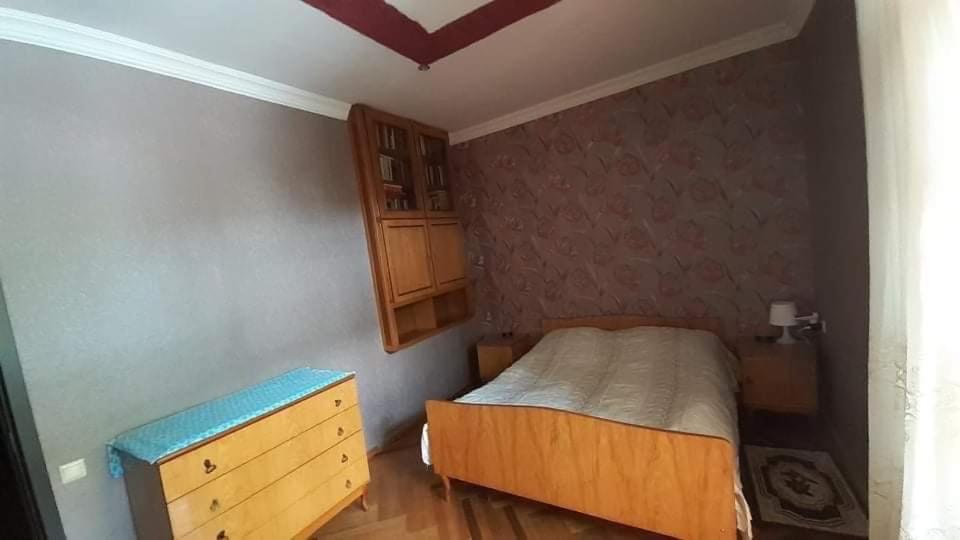 Postel nebo postele na pokoji v ubytování Rachvela's Guest House