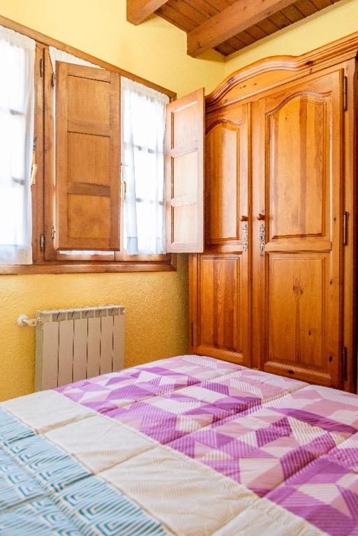 Postel nebo postele na pokoji v ubytování La Cabada