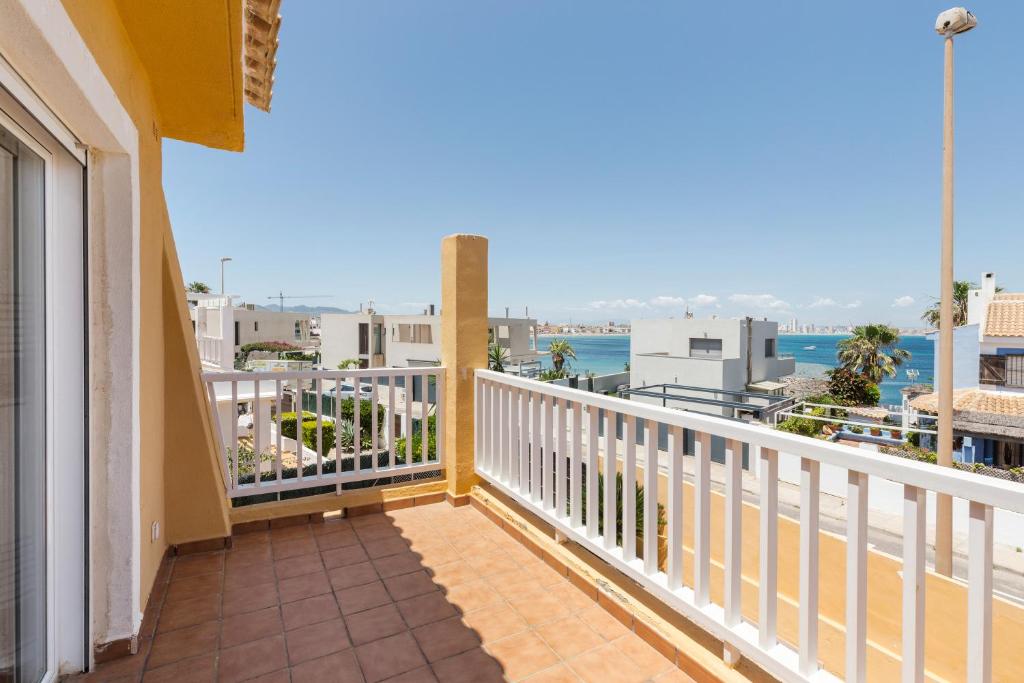 a balcony with a view of the ocean at La Cala in Cabo de Palos