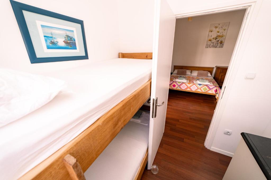 Postel nebo postele na pokoji v ubytování Guesthouse Lastavica