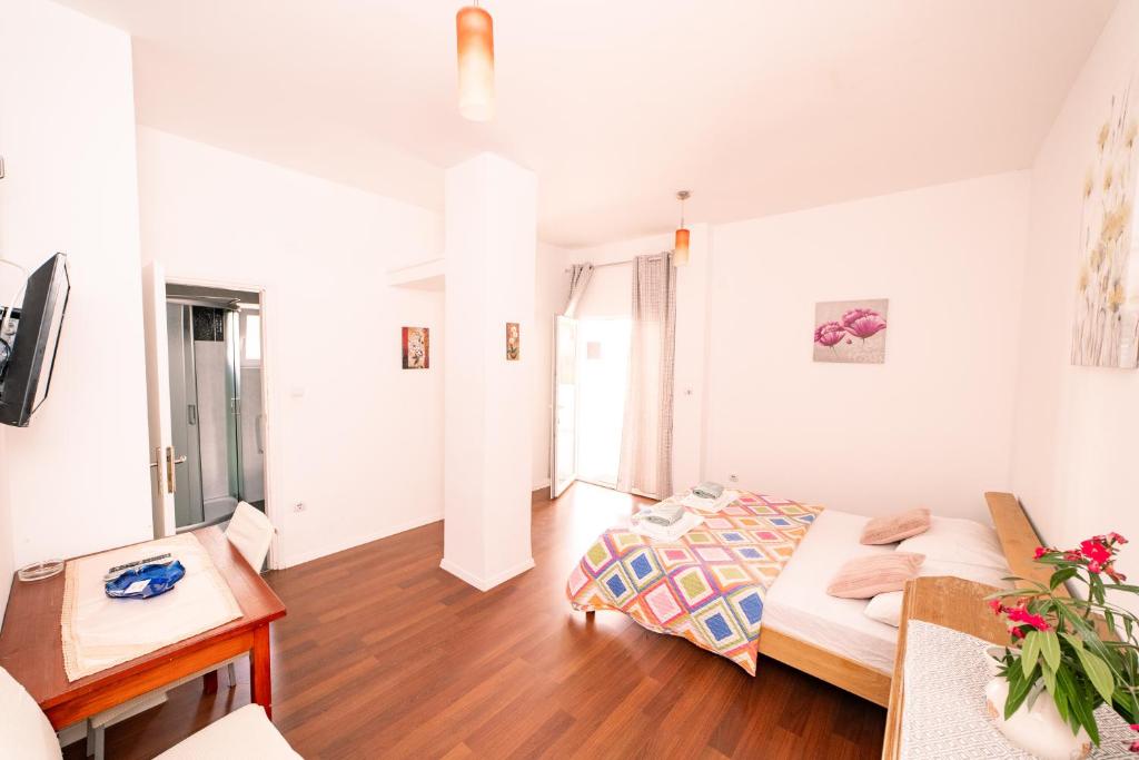TV a/nebo společenská místnost v ubytování Guesthouse Lastavica