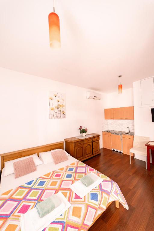 Postel nebo postele na pokoji v ubytování Guesthouse Lastavica