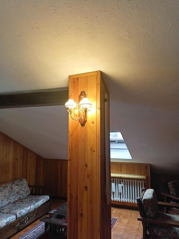 Postel nebo postele na pokoji v ubytování Mansarda