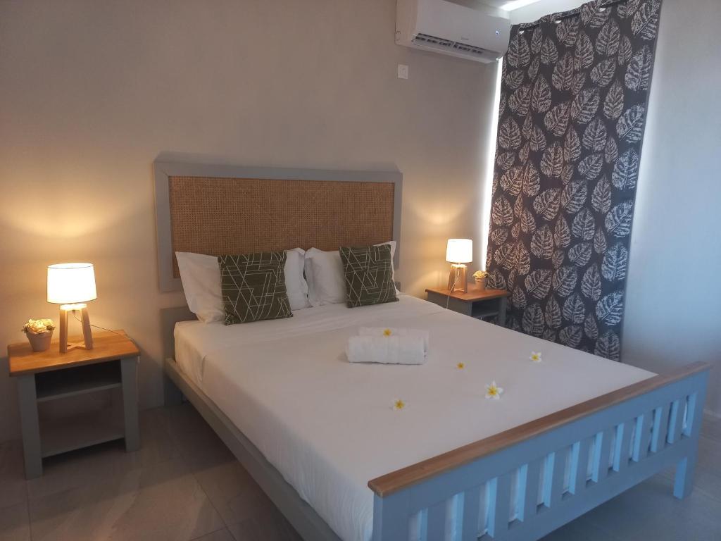 Postel nebo postele na pokoji v ubytování Bois Mapou Self Catering Apartments Unit 101