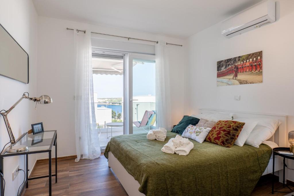 Postel nebo postele na pokoji v ubytování Casa Carmen Simuni