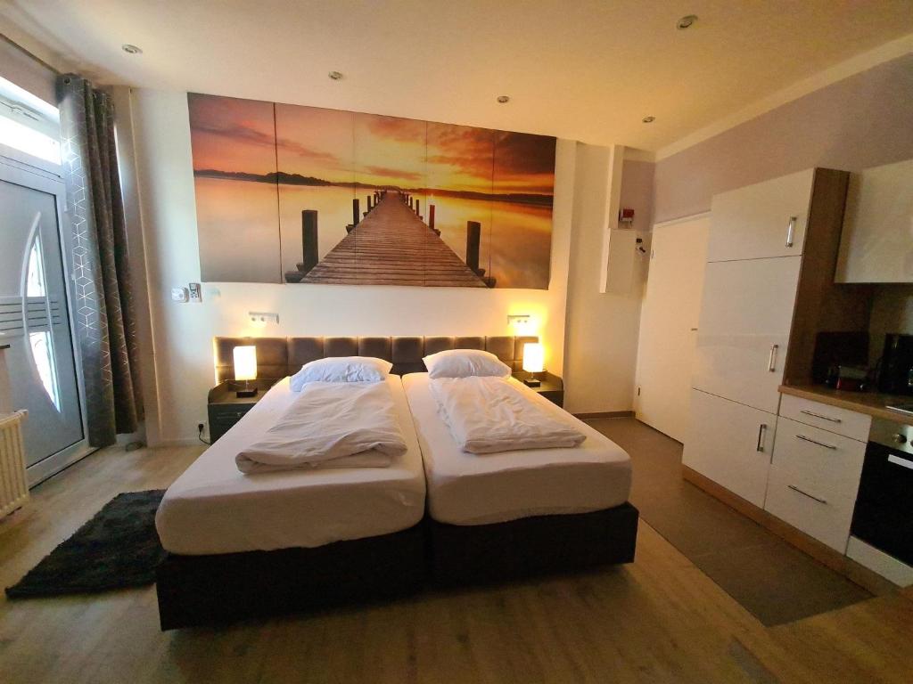 Un pat sau paturi într-o cameră la ferienwohnung-32609 W1